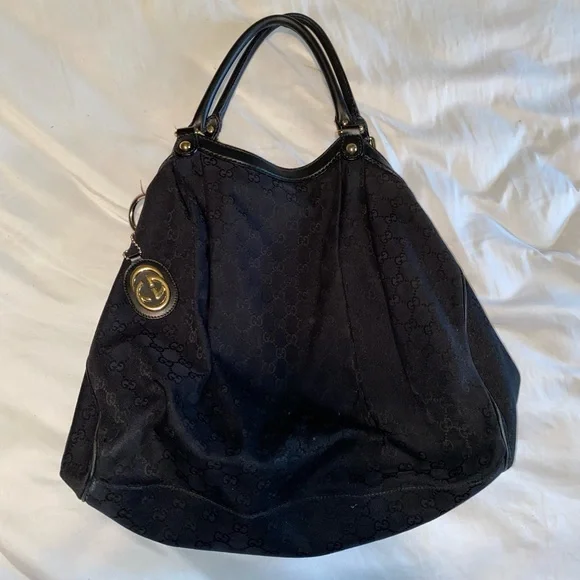 Authentic Black Gucci XL Suckey - Picture 1 of 9